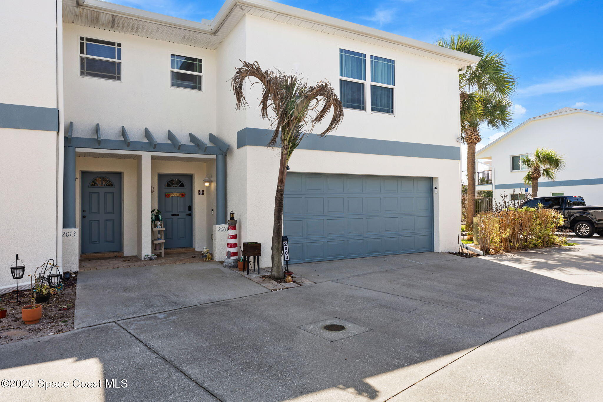 2003 Cato Court, Unit F8 Indialantic, FL 32903 - Photo 33 of 41 Frnot Door West Facing