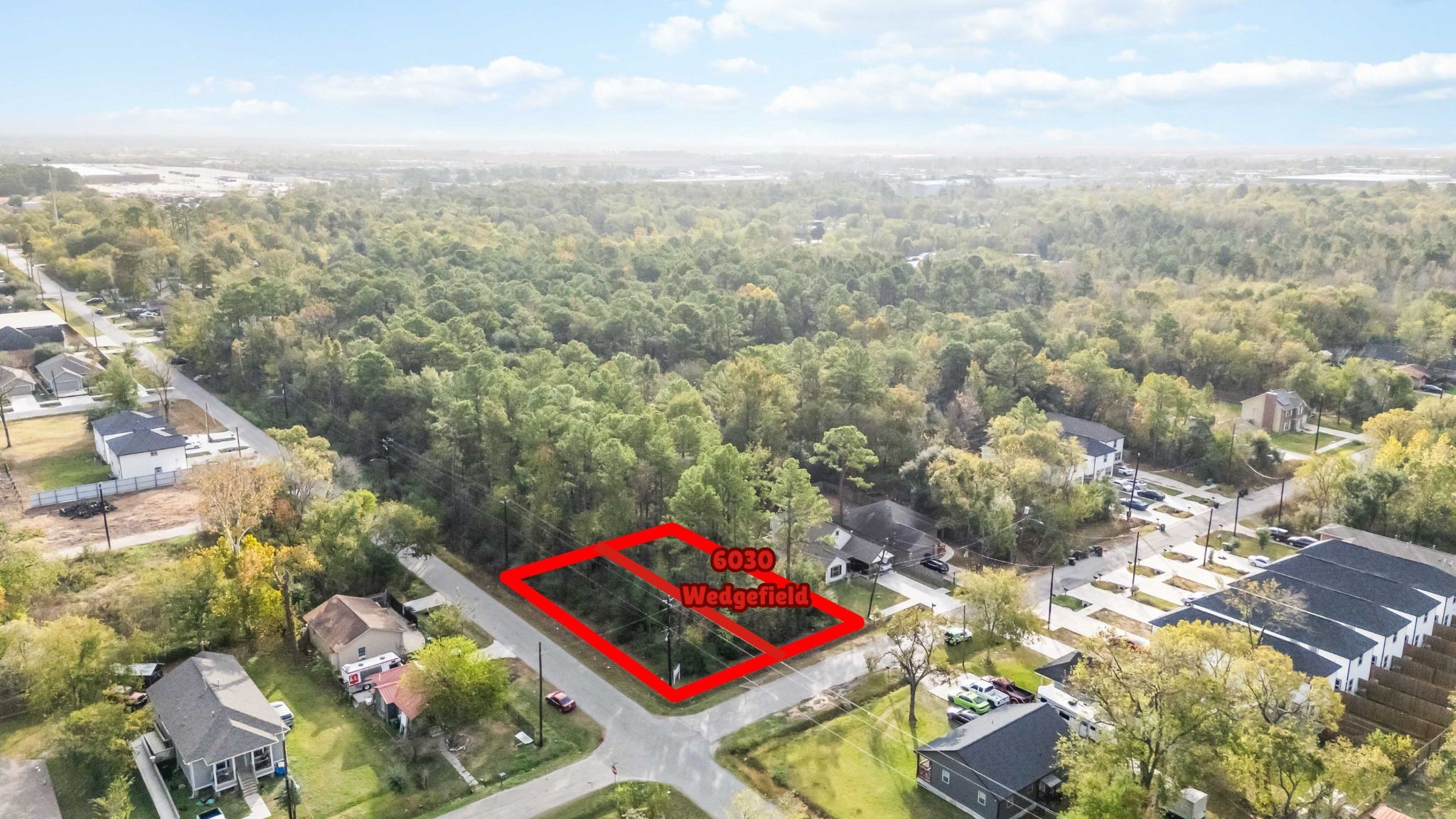 6030 Wedgefield Street Houston, TX 77028 - Photo 3 of 8 an aerial view of residential houses with cars