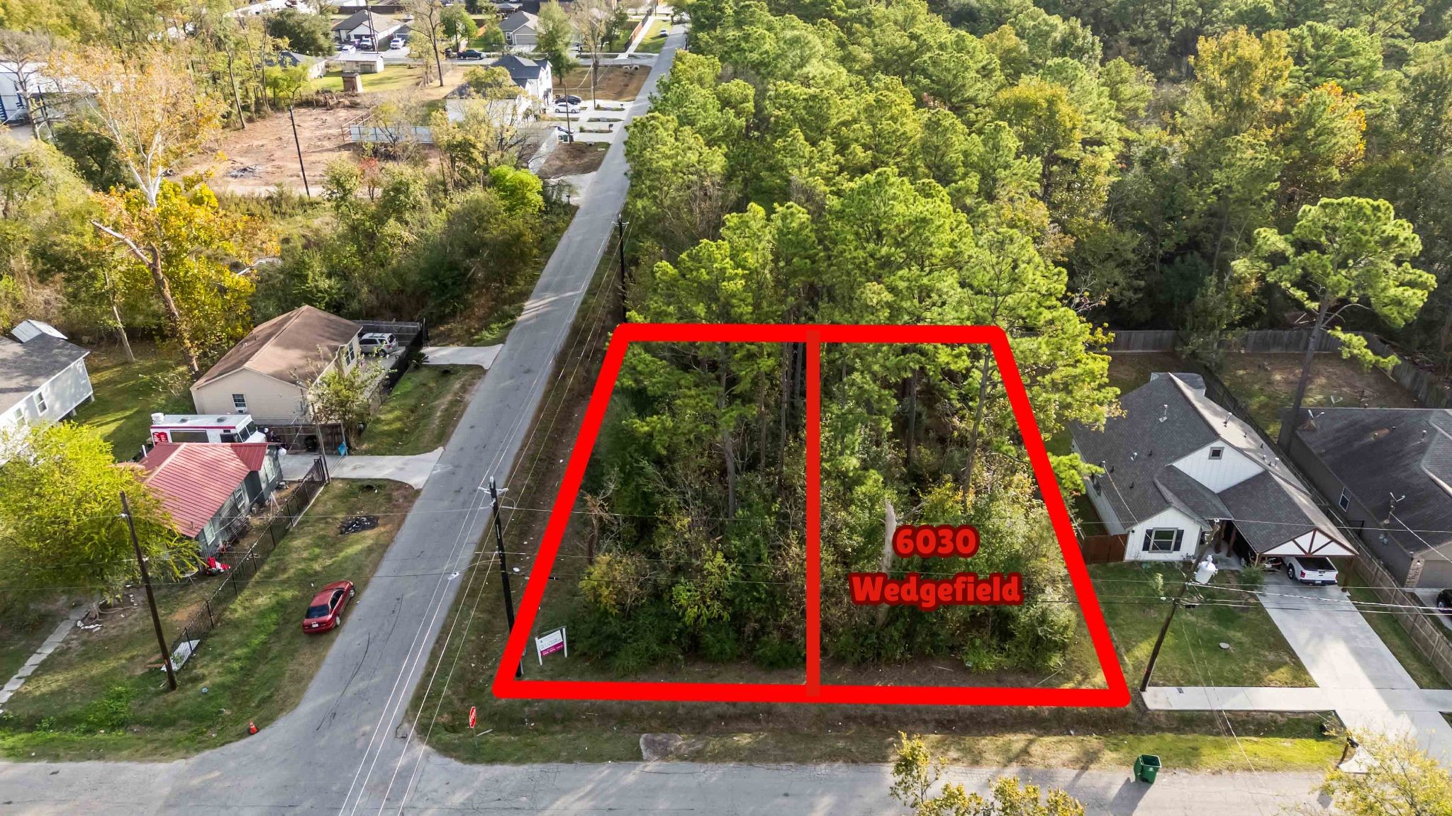 6030 Wedgefield Street Houston, TX 77028 - Photo 4 of 8 a view of entryway with yard and flowers