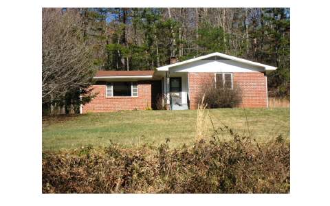 323 Owl Creek Road Murphy, NC 28906 - Photo 1 of 1 a view of a house with a yard and garage