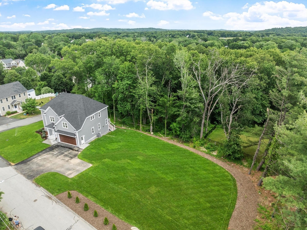 37 Dogwood Road Littleton, MA 01460 - Photo 27 of 36 a view of a house with a yard
