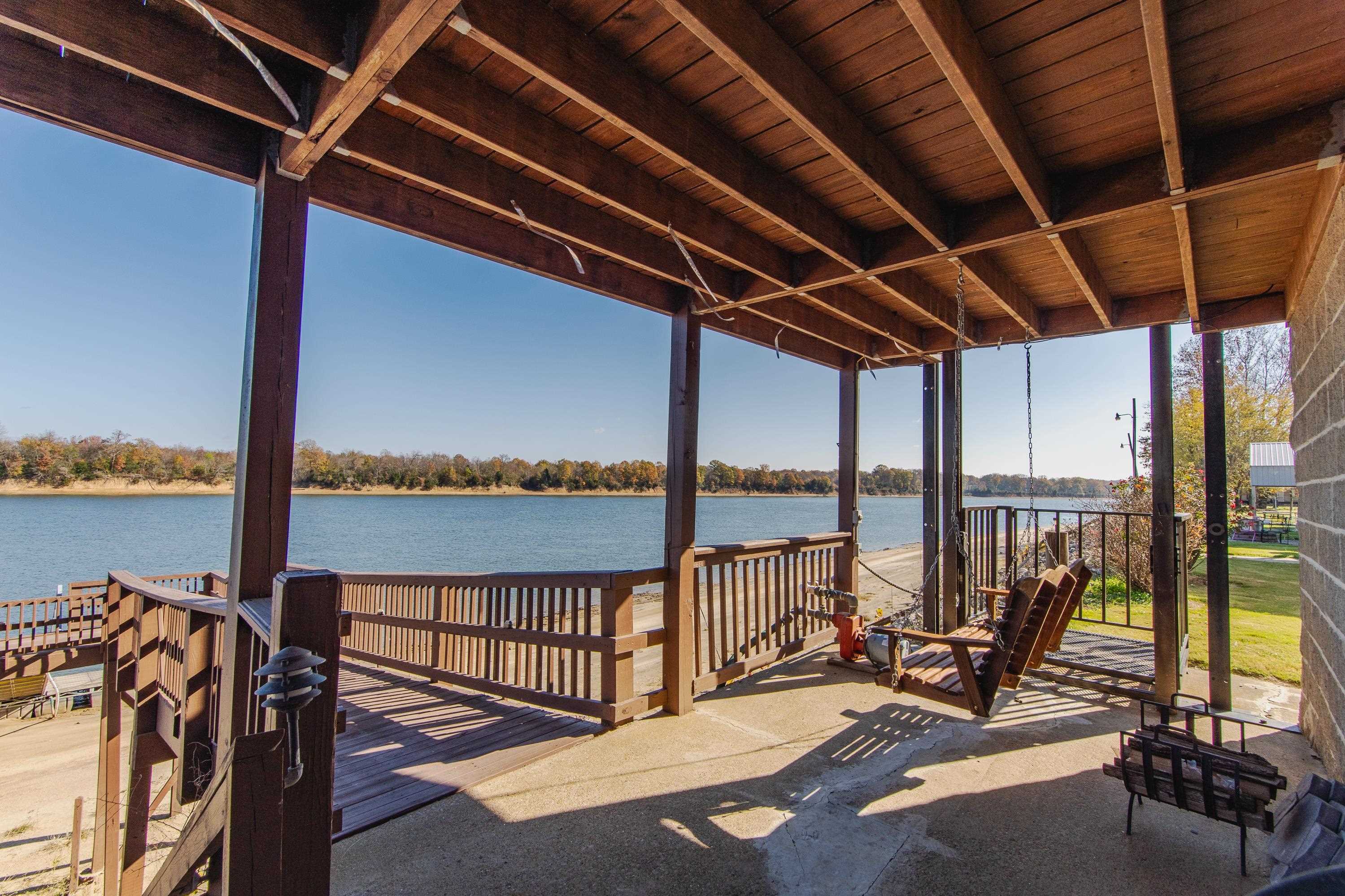 1111 Leaning Trees Lane Adamsville, TN 38310 - Photo 2 of 25 a view of a ocean from a balcony