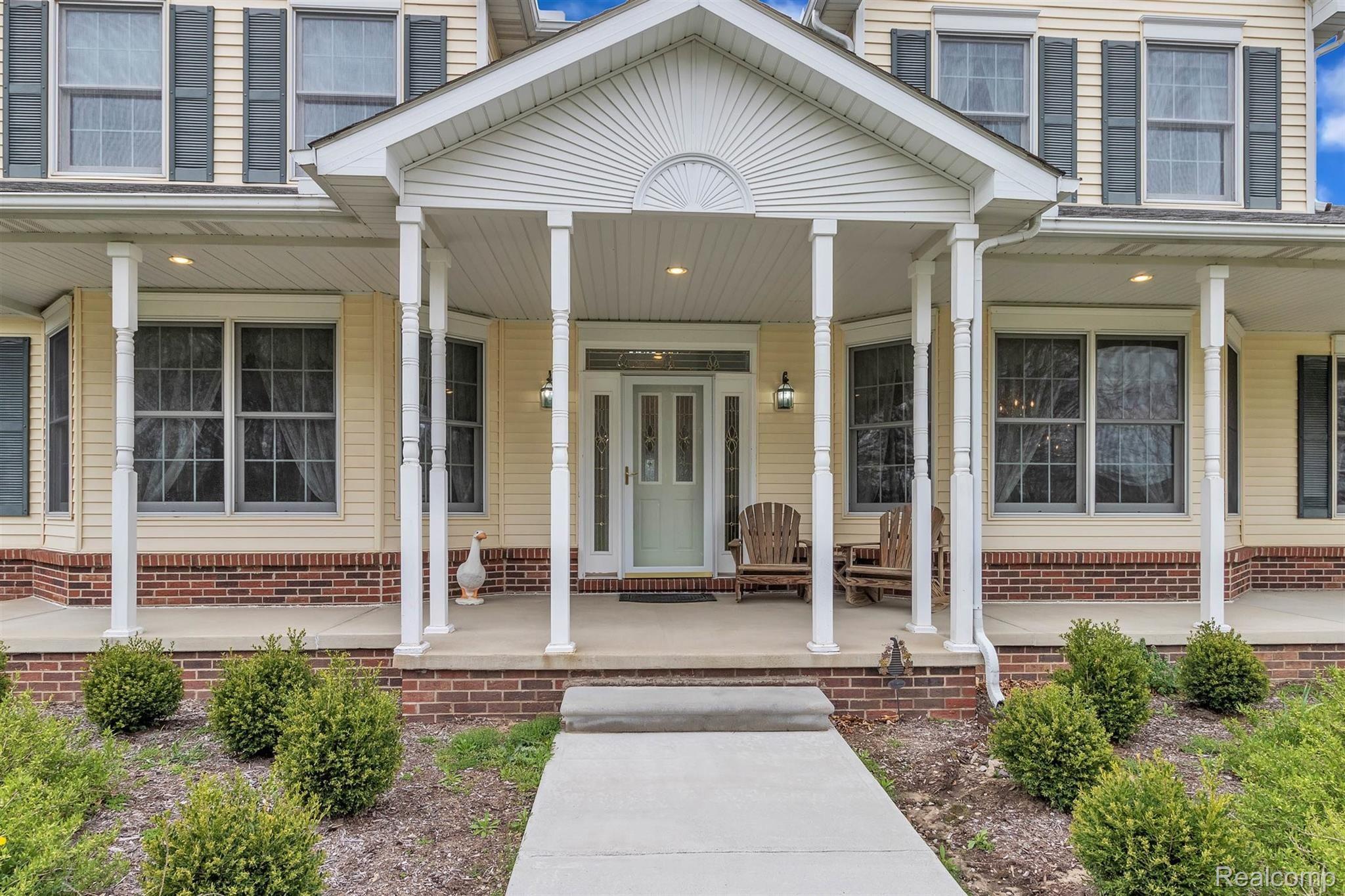 5275 Dansville Road Stockbridge, MI 49285 - Photo 4 of 85 Porch facing south, concrete covered, lovely!