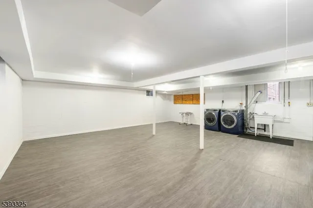 a view of a livingroom with furniture and a ceiling fan