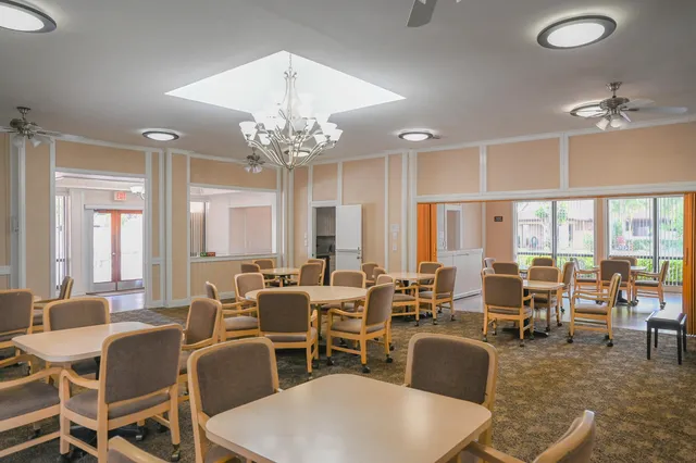 a kitchen with sink cabinets and microwave