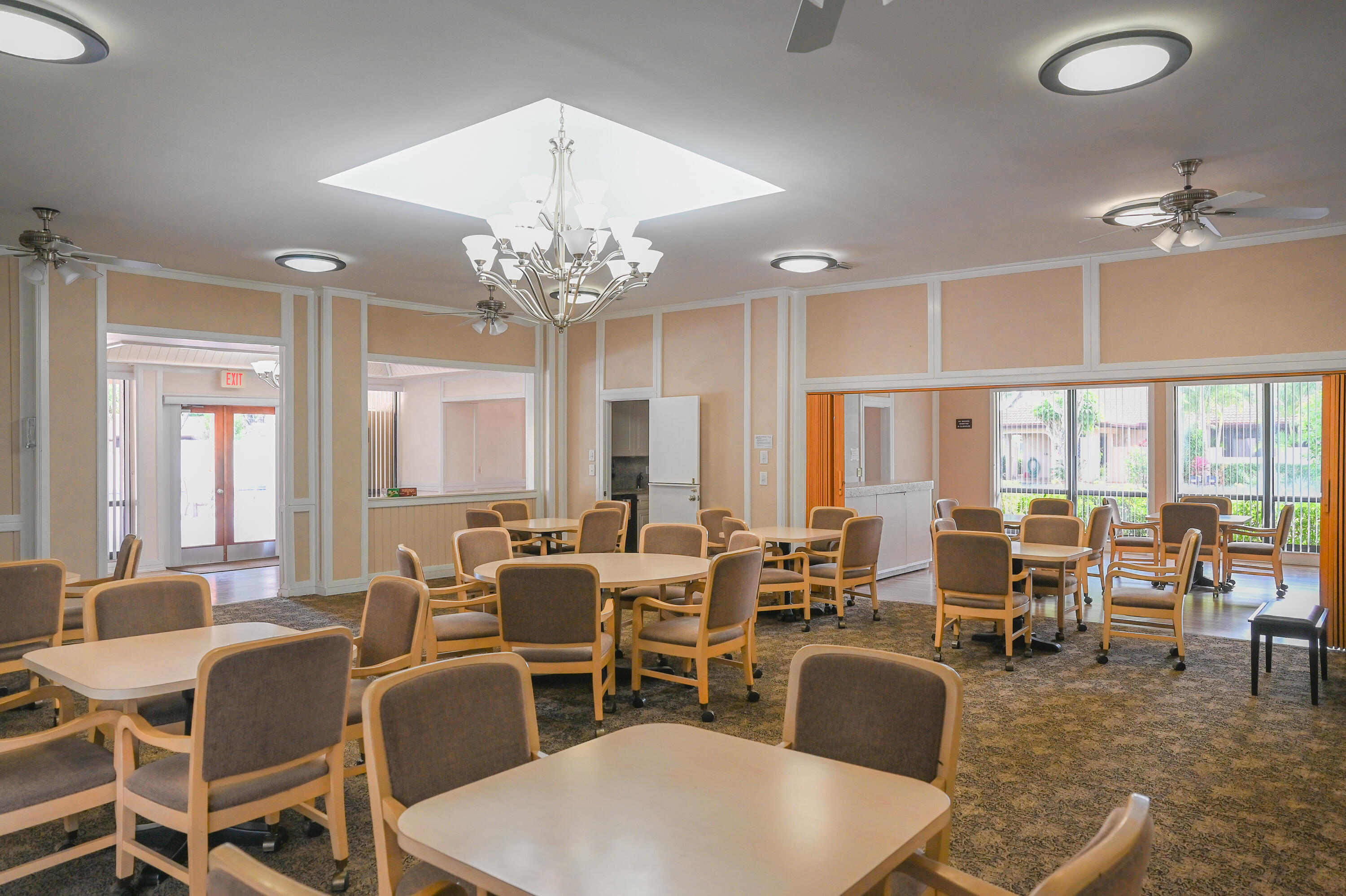 9259 Vista Del Lago, Unit 18J Boca Raton, FL 33428 - Photo 33 of 37 a view of a dining room with furniture window and outside view
