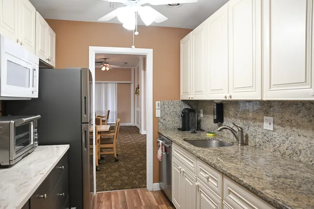 a view of a dining room with furniture