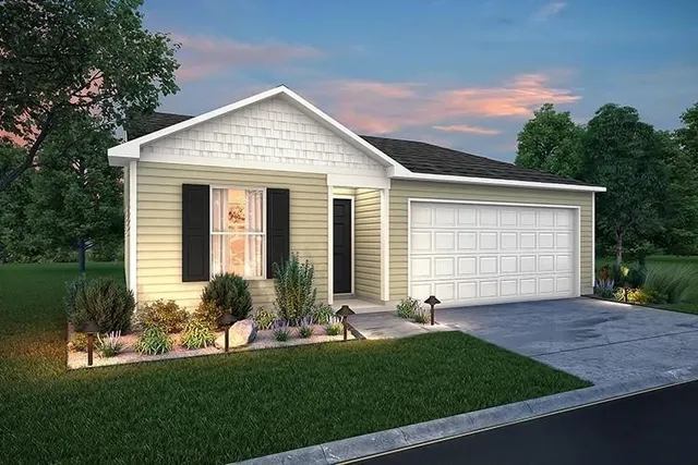 a view of a house with backyard and garden