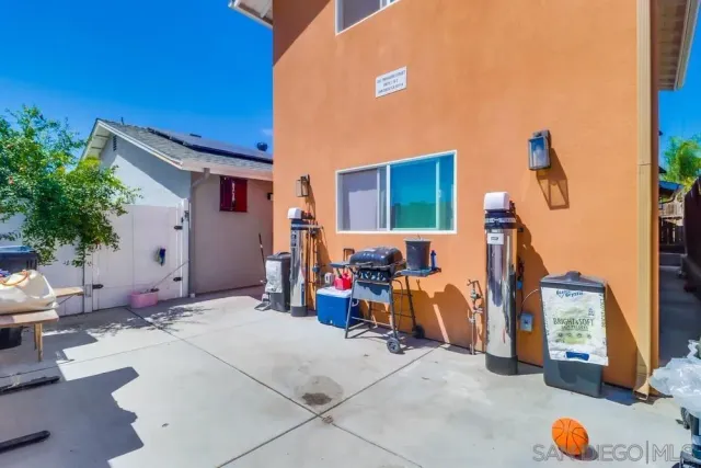 a view of a chairs and tables in patio