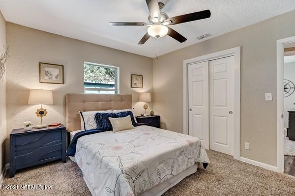 100 Lighthouse Road South Jacksonville, FL 32225 - Photo 17 of 33 a bedroom with a bed and a window