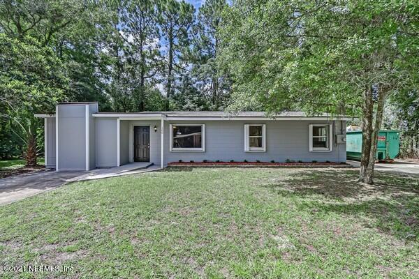 100 Lighthouse Road South Jacksonville, FL 32225 - Photo 2 of 33 front view of a house with a yard