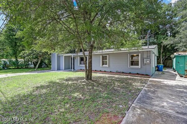 100 Lighthouse Road South Jacksonville, FL 32225 - Photo 28 of 33 a view of a house with a yard and large tree
