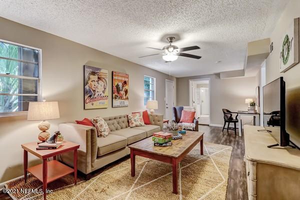 100 Lighthouse Road South Jacksonville, FL 32225 - Photo 7 of 33 a living room with furniture and a flat screen tv