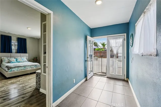 a bedroom with a bed and couch