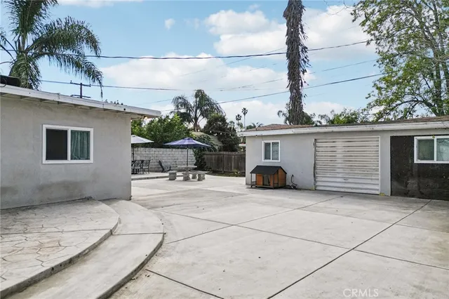 a view of yard with car parked