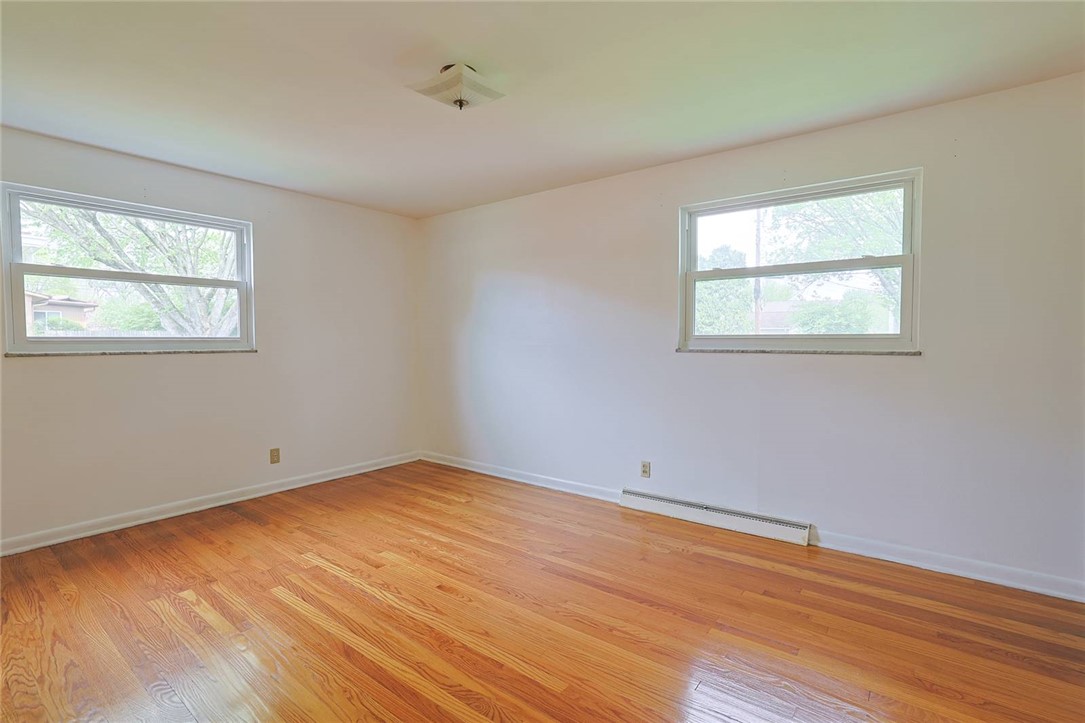 452 Cookston Avenue Springfield, OH 45503 - Photo 13 of 34 This bright room features polished hardwood floors and ample natural light through large windows.