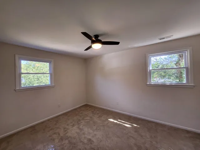 an empty room with windows