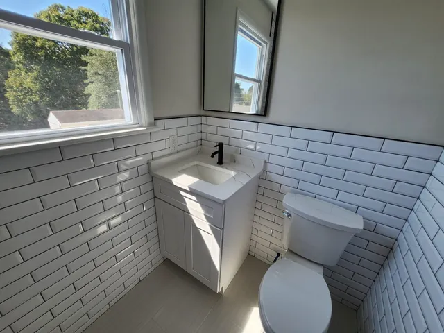 a view of empty room with windows