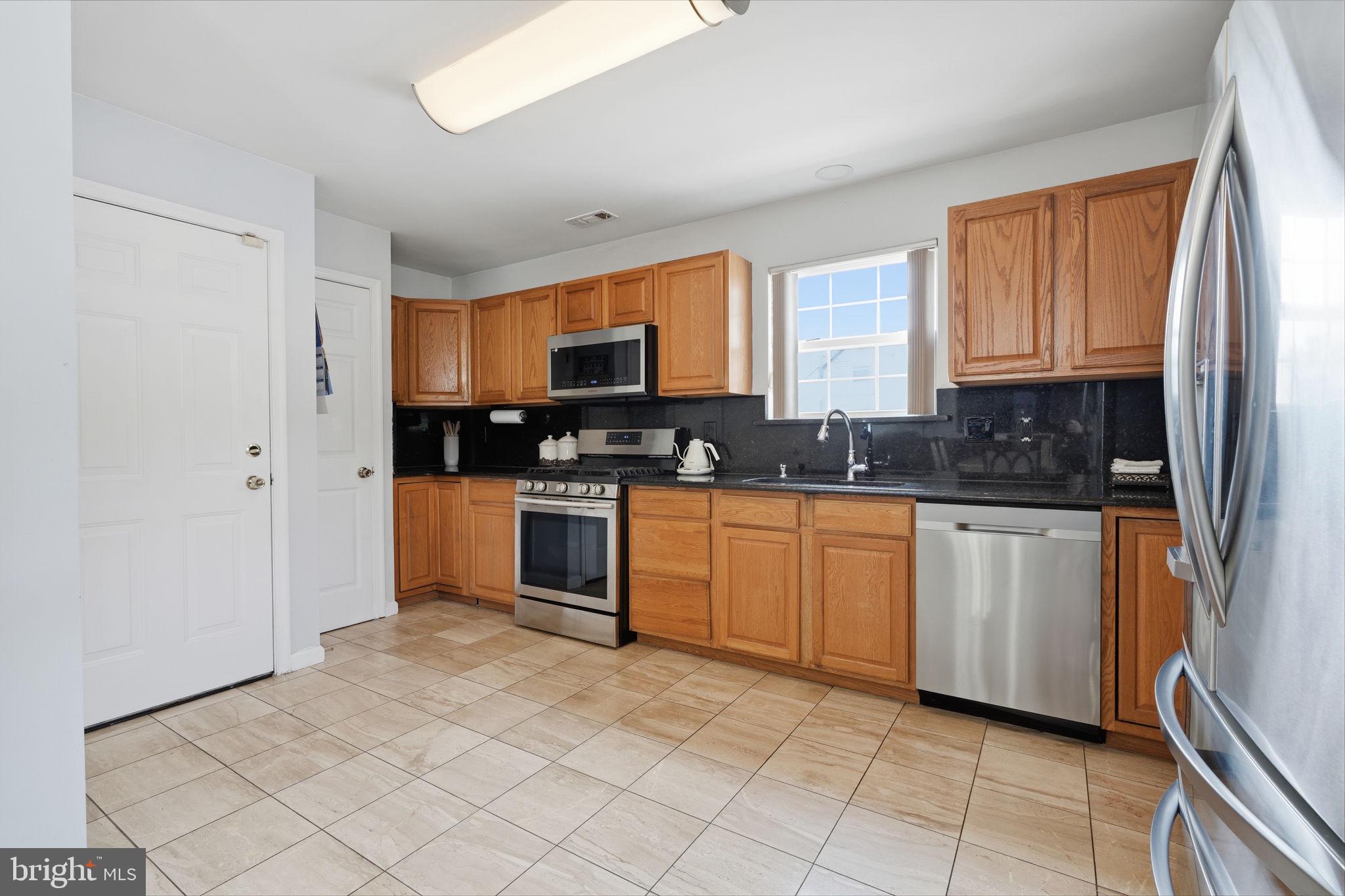 2347 Maple Avenue Croydon, PA 19021 - Photo 15 of 60 Modern kitchen with warm wood tones.