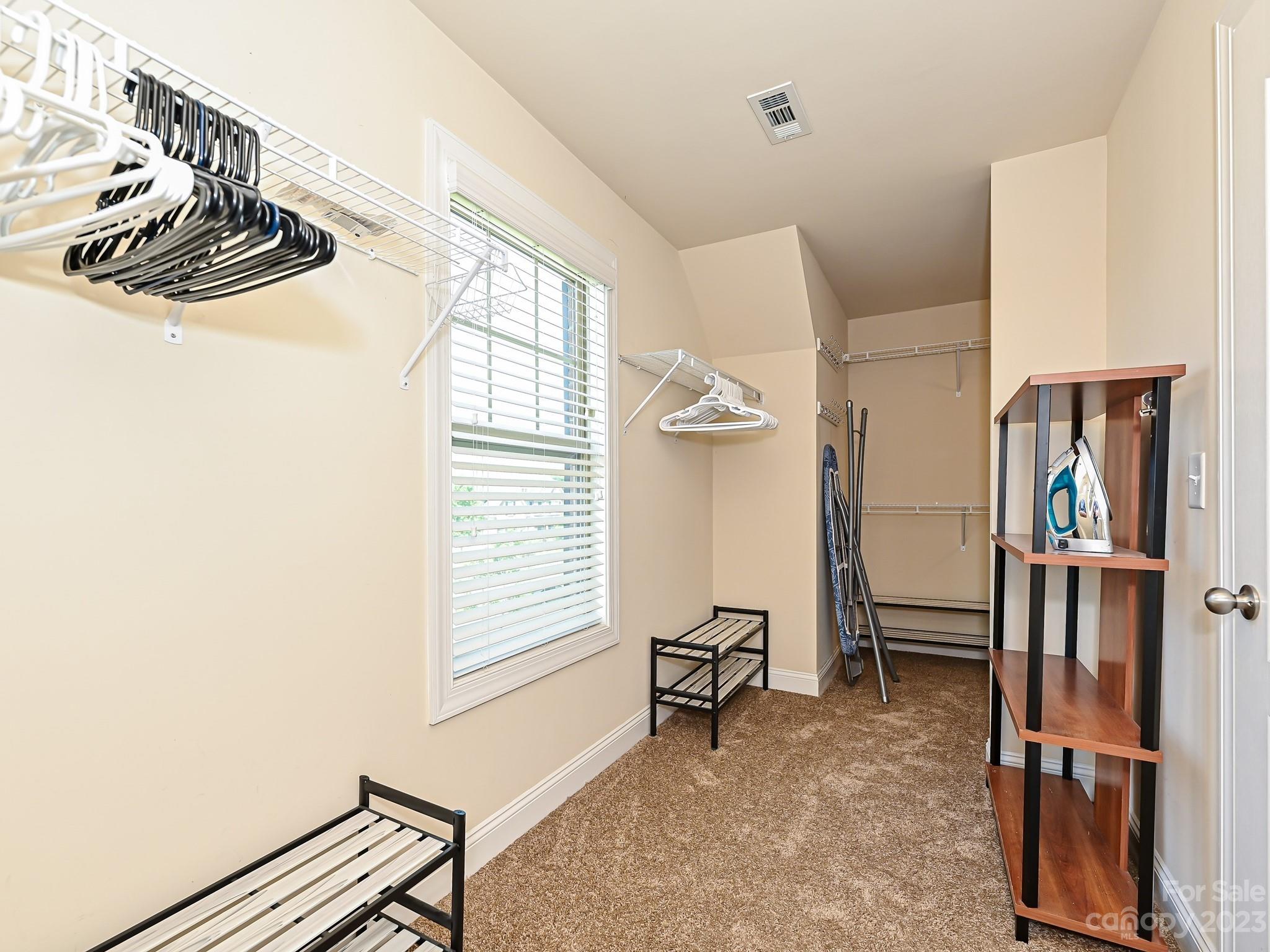 1012 Thorndale Road Indian Trail, NC 28079 - Photo 24 of 36 a view of a livingroom with furniture and a window