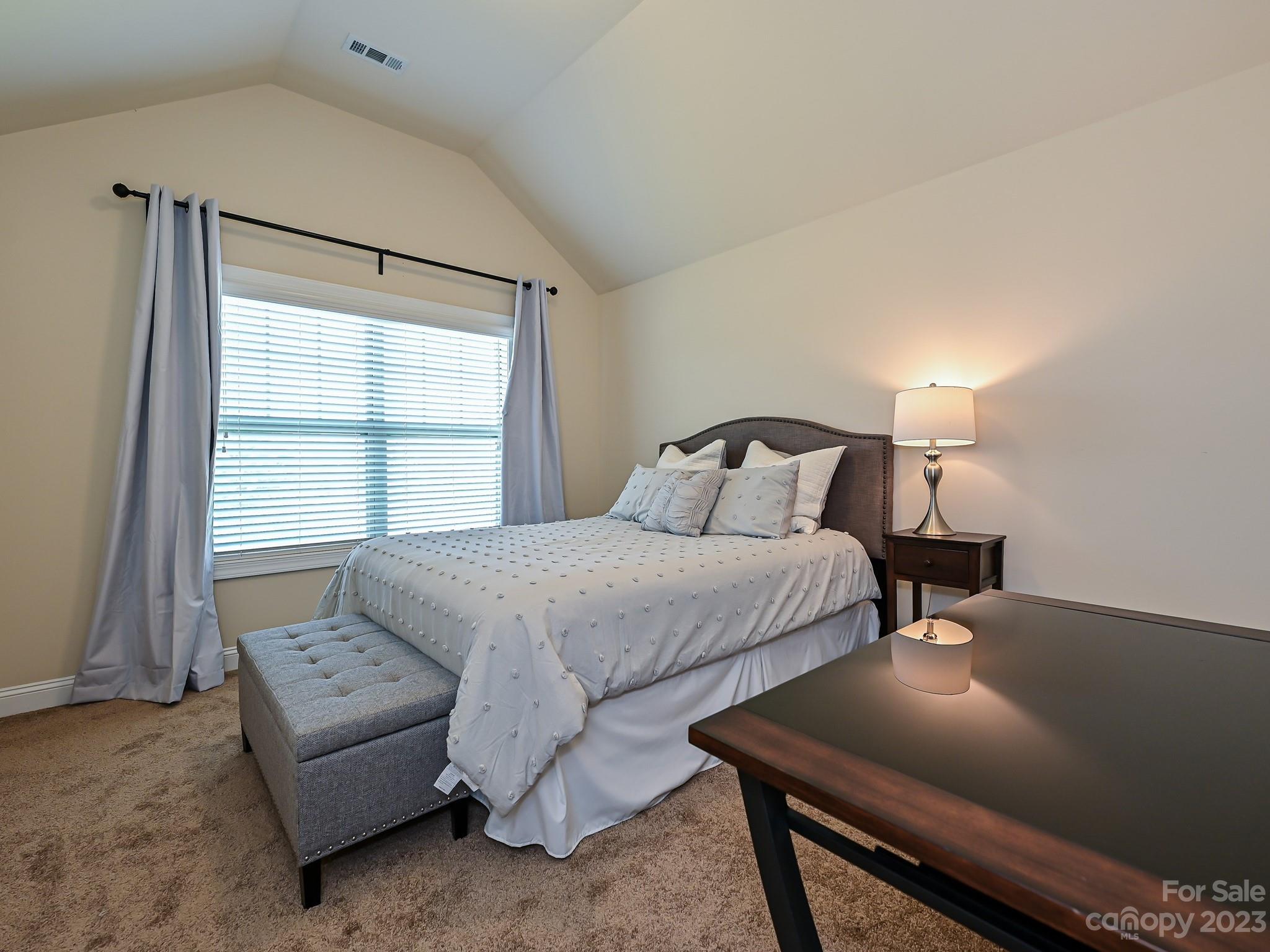 1012 Thorndale Road Indian Trail, NC 28079 - Photo 26 of 36 a bedroom with a bed and a window