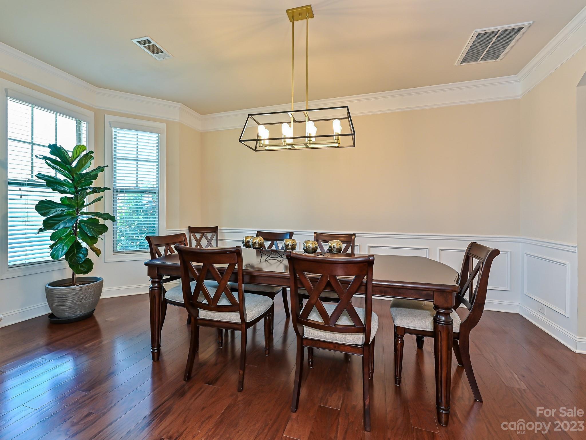 1012 Thorndale Road Indian Trail, NC 28079 - Photo 4 of 36 a view of a dining room with furniture window and wooden floor