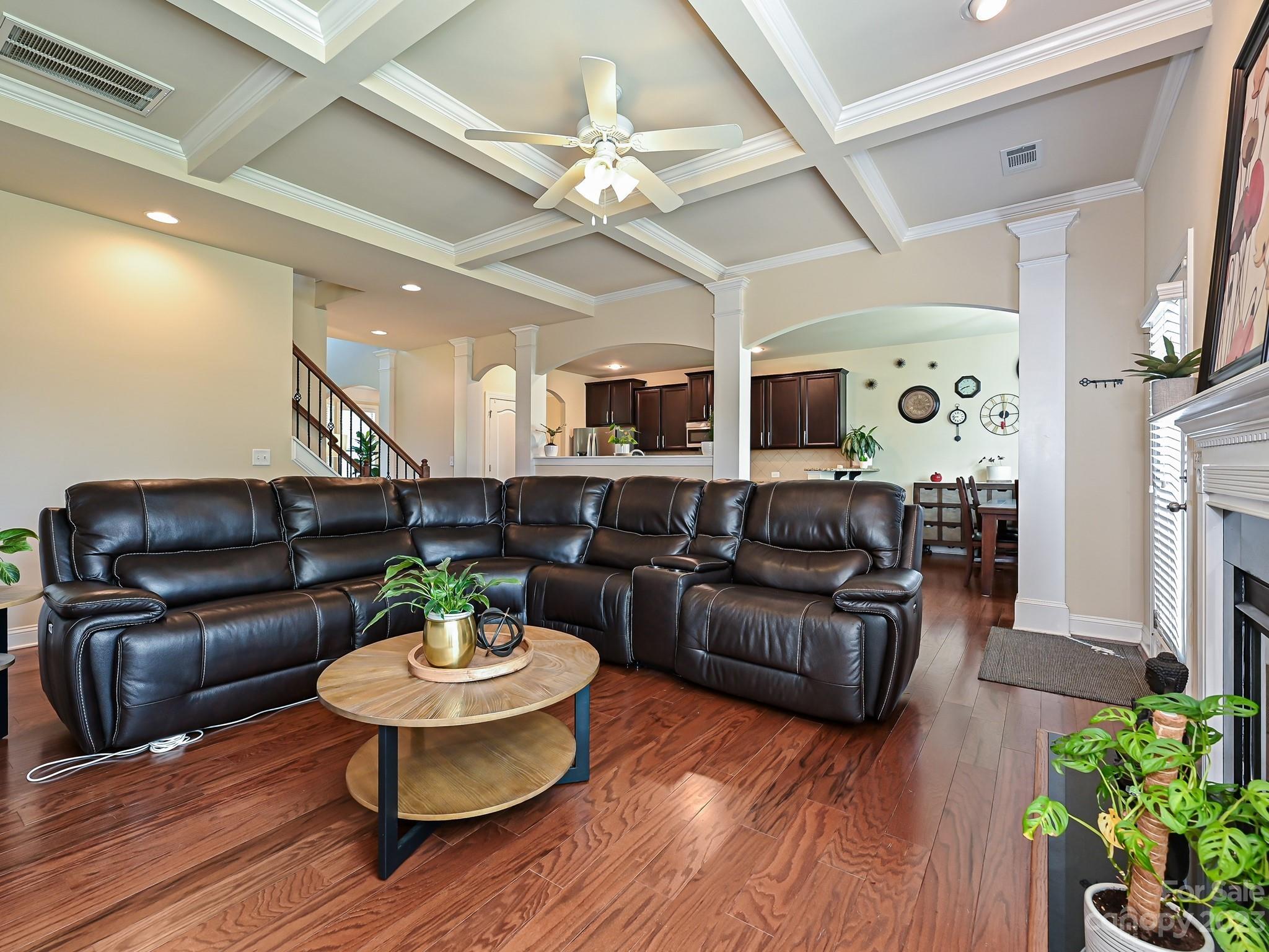 1012 Thorndale Road Indian Trail, NC 28079 - Photo 9 of 36 a living room with furniture and a dining table