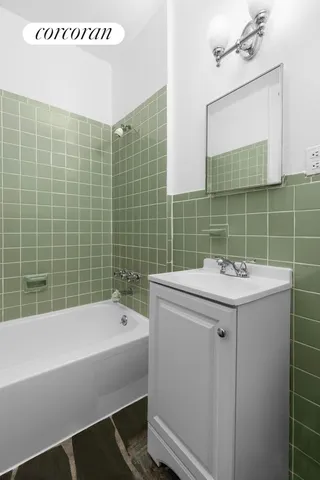 a view of an chairs and table in a living room