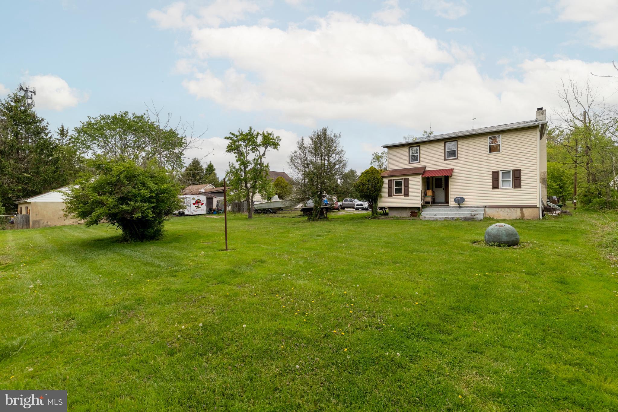 271 Old Croton Road Flemington, NJ 08822 - Photo 4 of 34 a view of a house with a big yard and sitting area