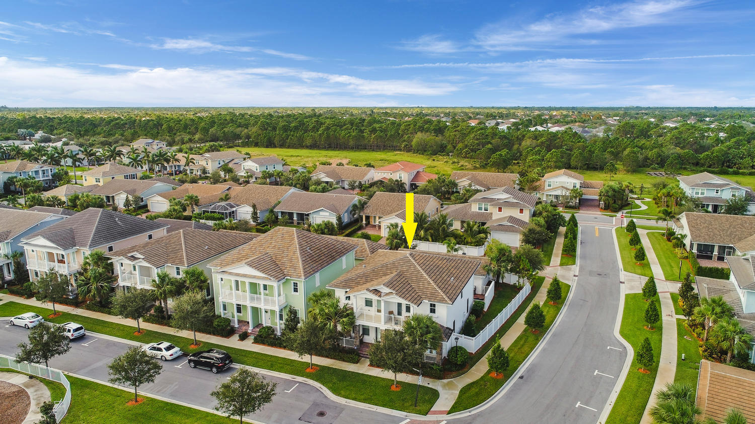 2706 Avalon Way Jupiter, FL 33458 - Photo 1 of 28 an aerial view of residential houses with outdoor space