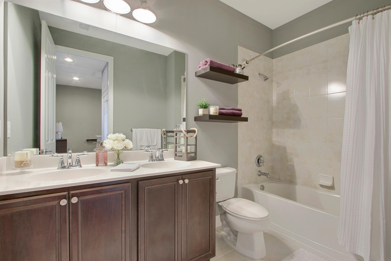 2706 Avalon Way Jupiter, FL 33458 - Photo 16 of 28 a bathroom with a sink toilet vanity and shower