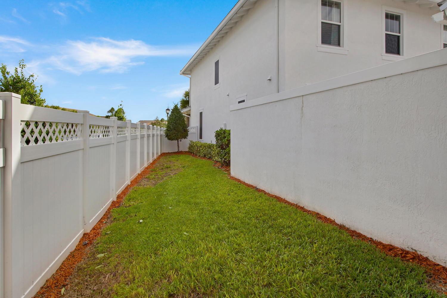 2706 Avalon Way Jupiter, FL 33458 - Photo 18 of 28 a view of a backyard
