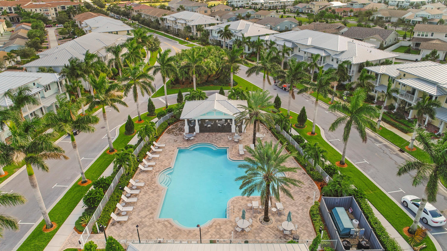 2706 Avalon Way Jupiter, FL 33458 - Photo 21 of 28 an aerial view of residential houses with outdoor space