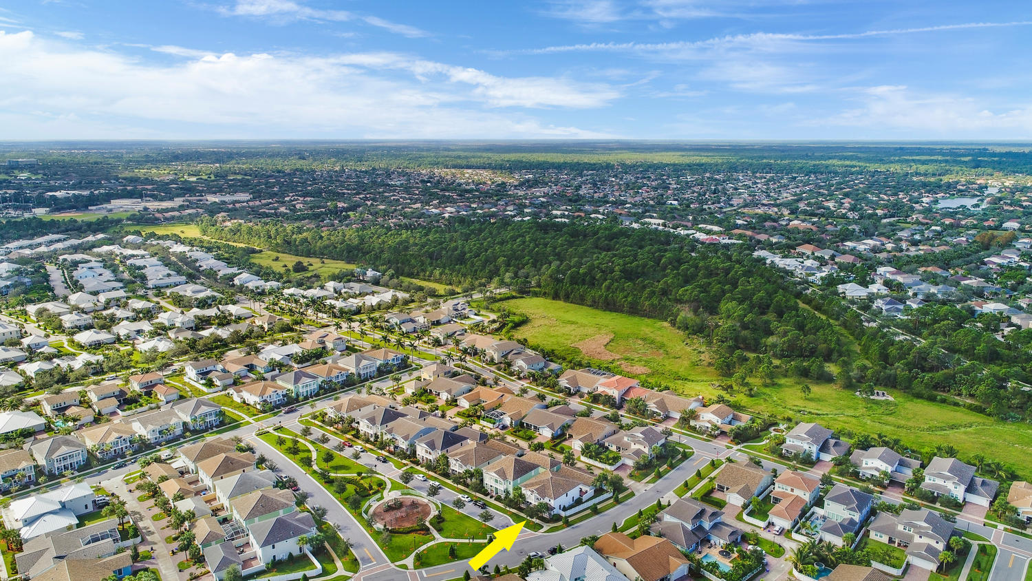 2706 Avalon Way Jupiter, FL 33458 - Photo 27 of 28 an aerial view of residential houses with outdoor space