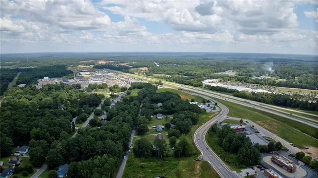 an aerial view of multiple house with outdoor space