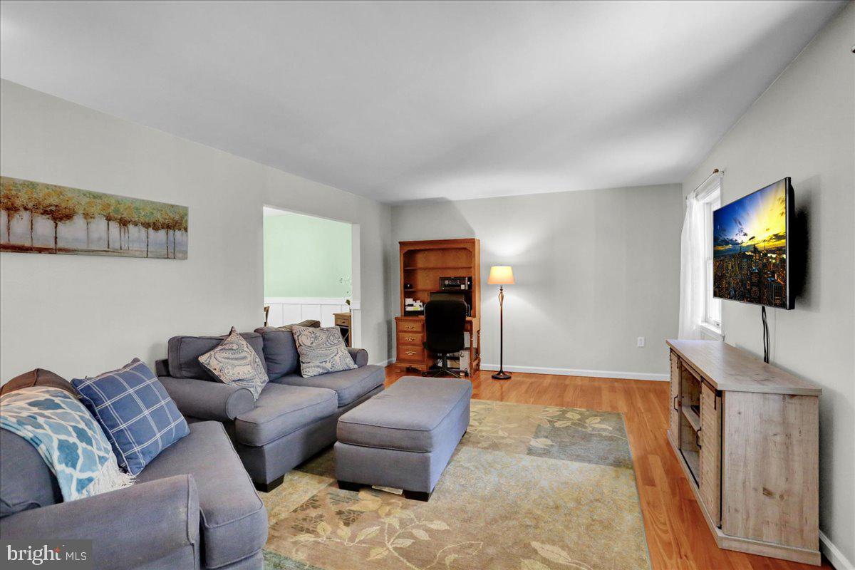 2581 Hill Road Reading, PA 19606 - Photo 18 of 53 a living room with furniture and a flat screen tv