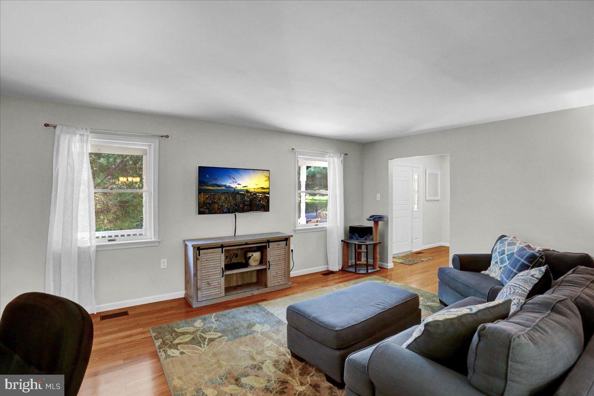 2581 Hill Road Reading, PA 19606 - Photo 19 of 53 a living room with furniture and a flat screen tv