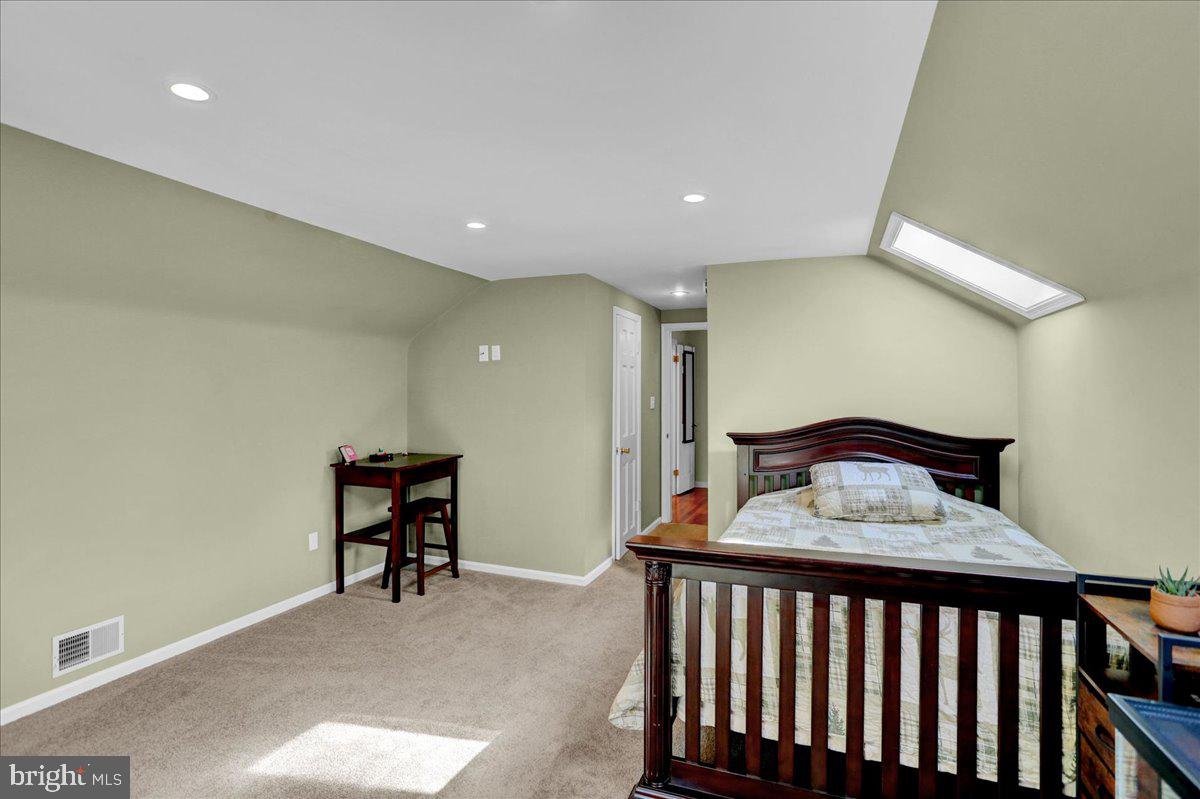 2581 Hill Road Reading, PA 19606 - Photo 42 of 53 a bedroom with furniture and a window