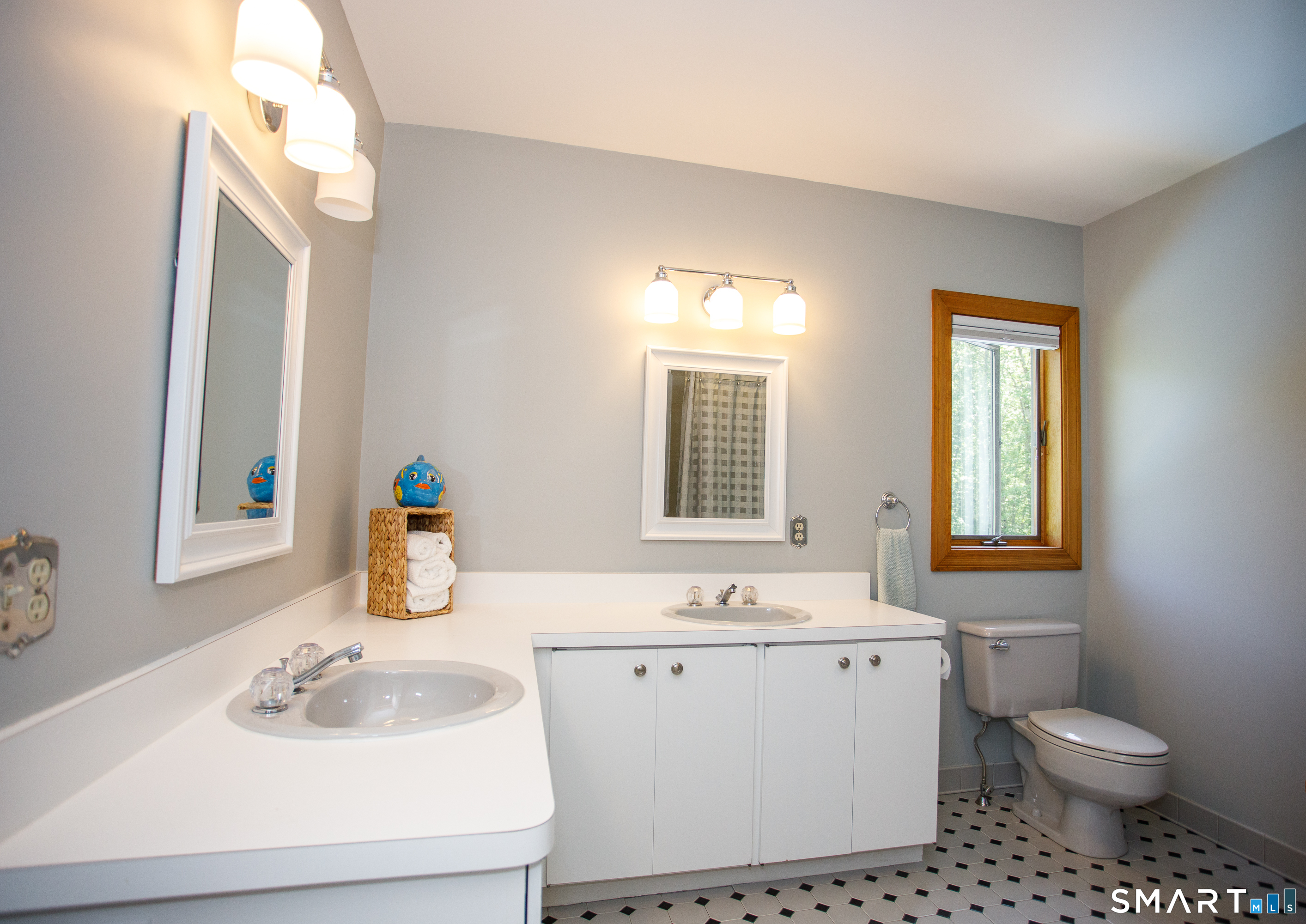 25 Stony Ridge Road Norwich, CT 06360 - Photo 27 of 40 a bathroom with a sink toilet and mirror