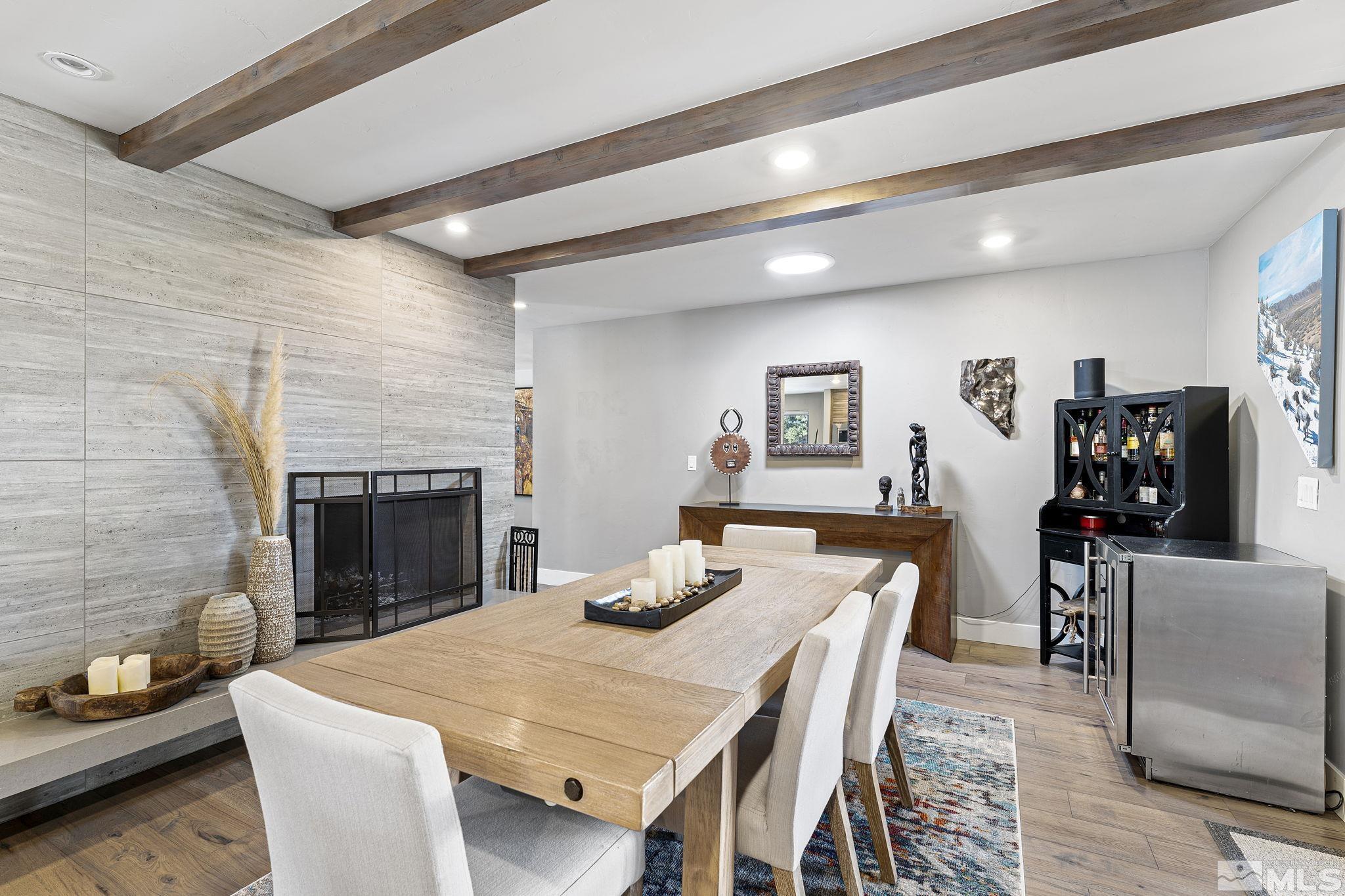1085 Sharon Way Reno, NV 89509 - Photo 14 of 40 a dining room with furniture and wooden floor