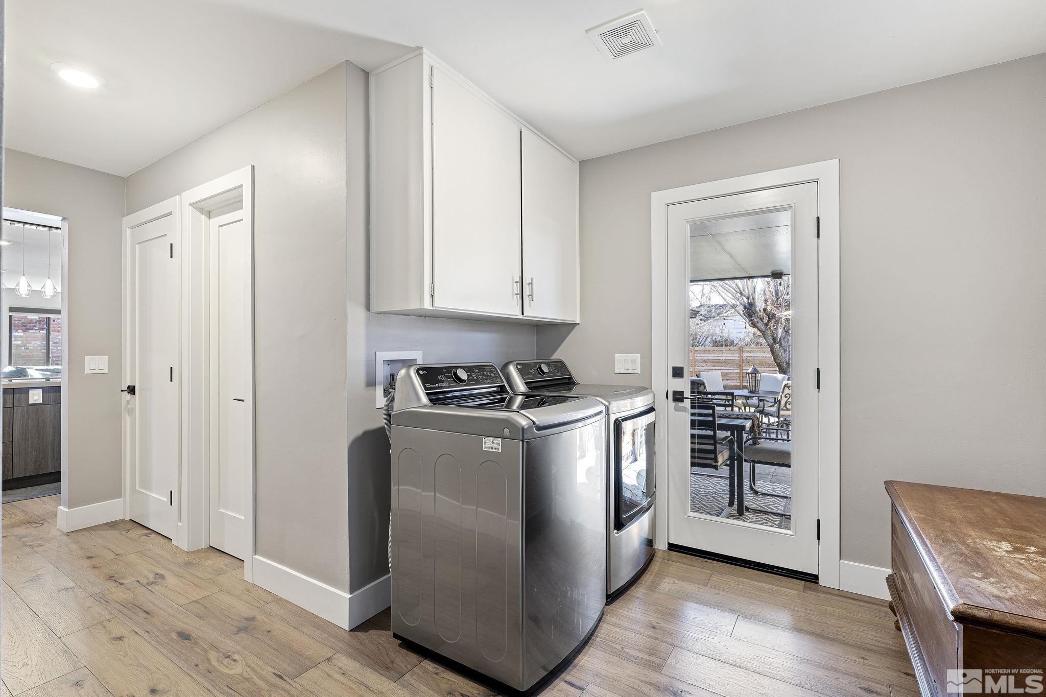 1085 Sharon Way Reno, NV 89509 - Photo 17 of 40 a kitchen with stainless steel appliances granite countertop a stove and a refrigerator