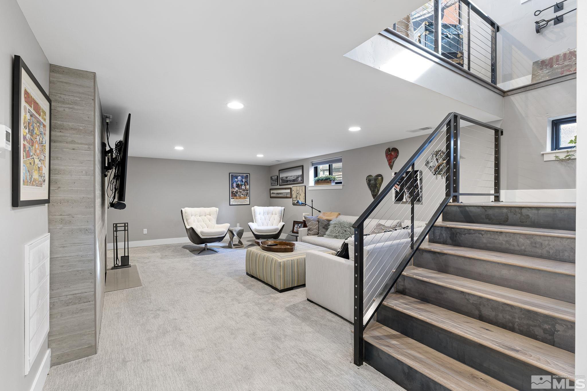 1085 Sharon Way Reno, NV 89509 - Photo 23 of 40 a living room with furniture and stairs