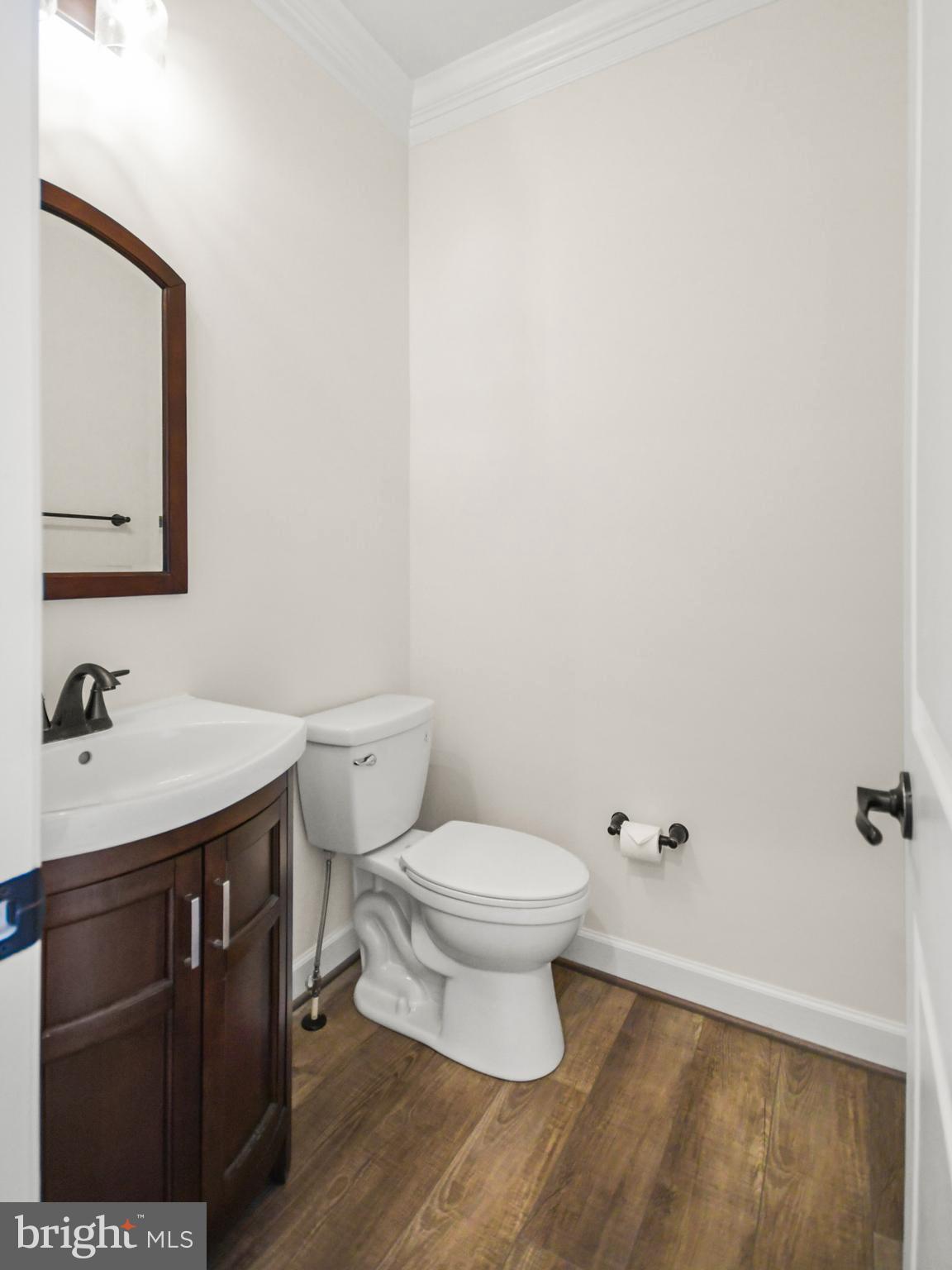 9813 Masser Road Frederick, MD 21702 - Photo 32 of 91 Half bath tucked between dining room and kitchen..
