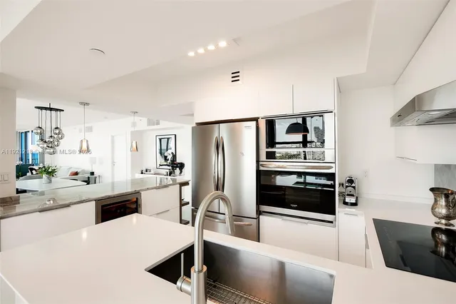 a balcony with table and chairs