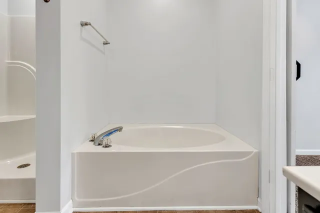 a bathroom with a bathtub