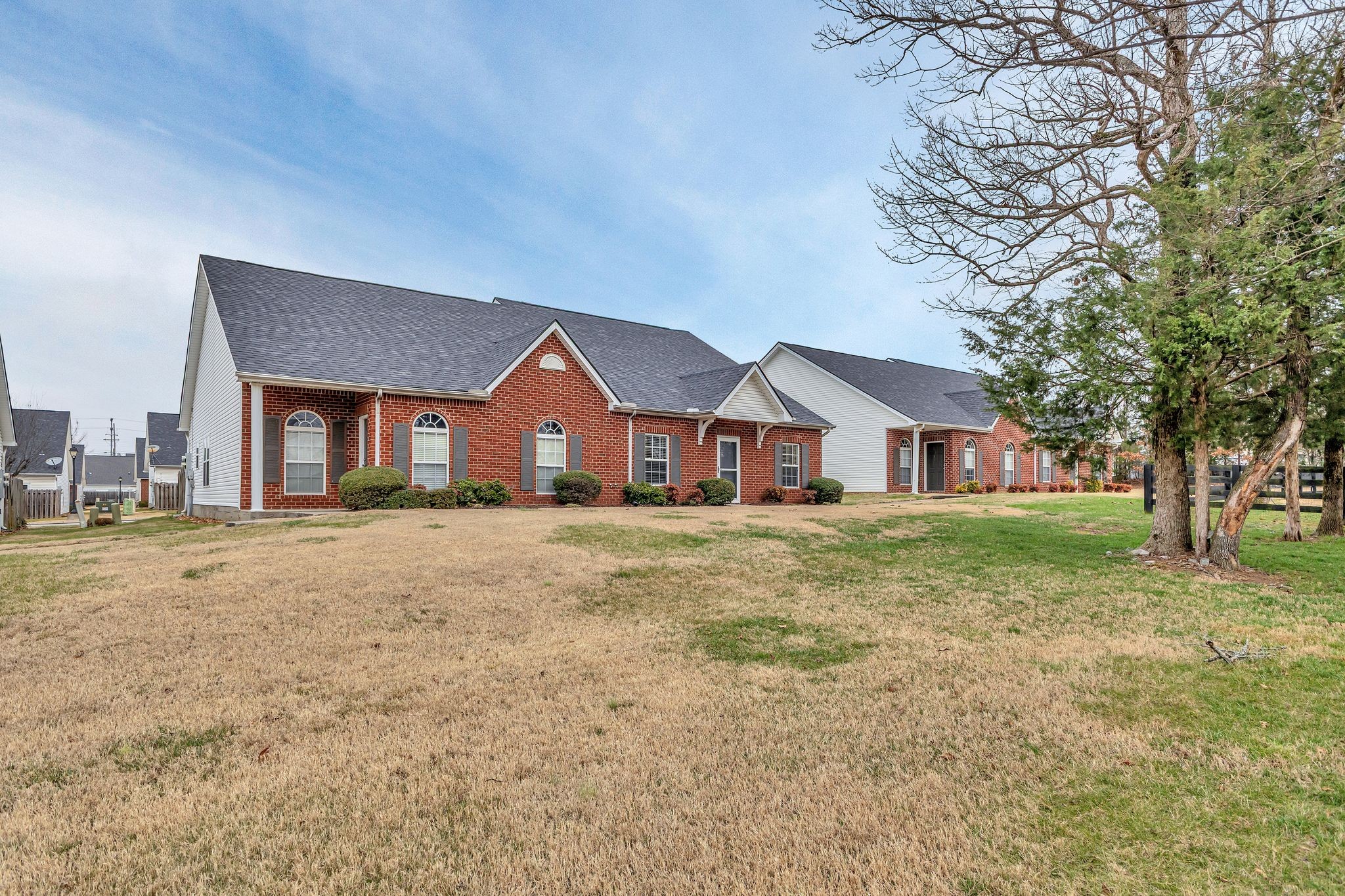 1019 Briggs Lane Spring Hill, TN 37174 - Photo 4 of 40 a front view of a house with a yard