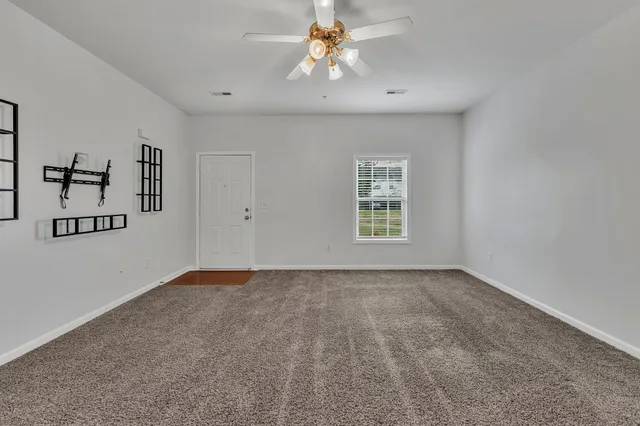a view of an empty room with window