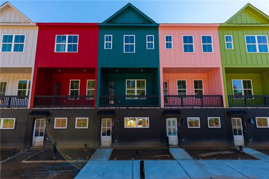 166 Color Circle, Unit 52 Atlanta, GA 30317 - Photo 1 of 1 a front view of a building with many windows