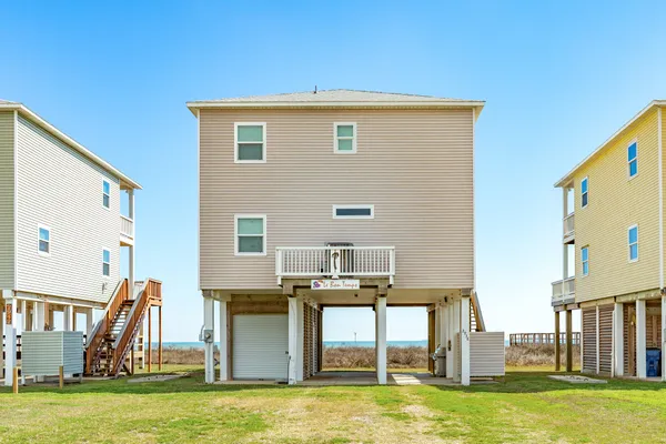 a view of a balcony with wooden floor