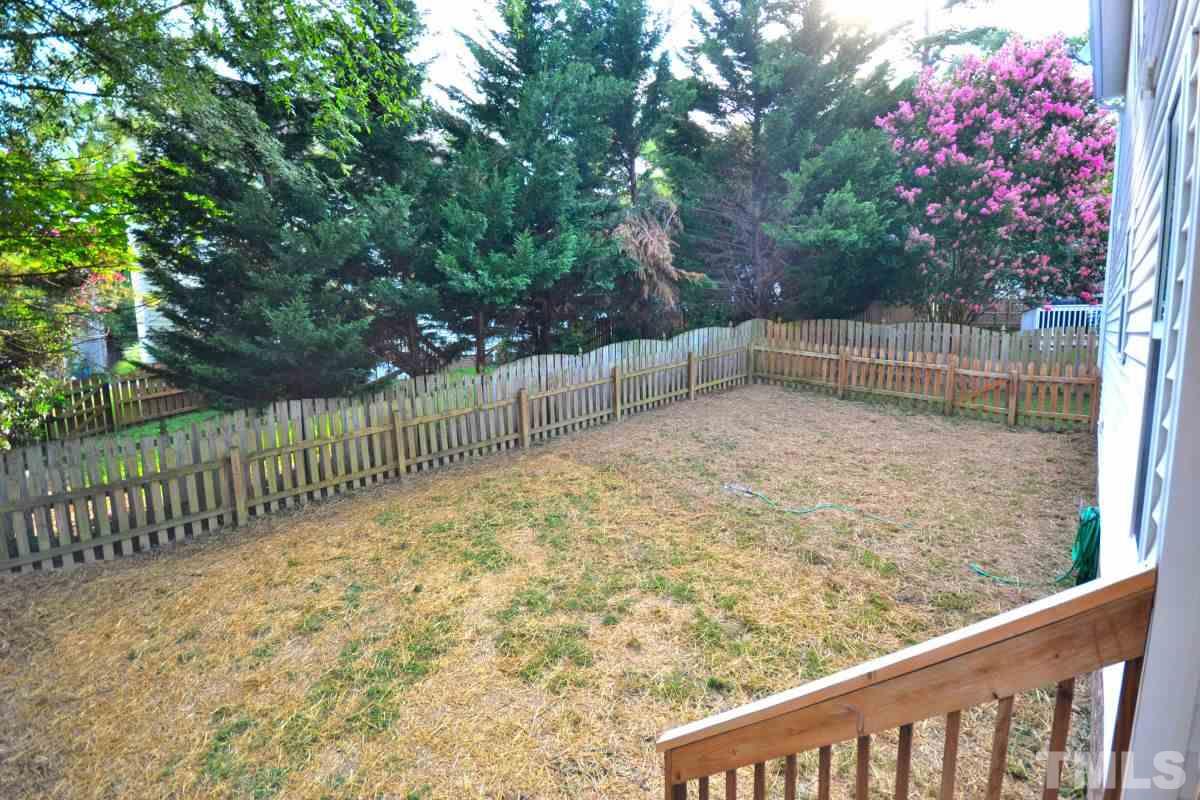 2908 Englefield Drive Raleigh, NC 27615 - Photo 12 of 16 a view of balcony with wooden fence